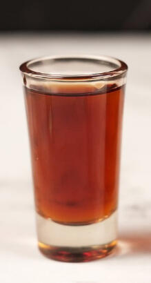 Rocket Fuel - Just like you'd suspect, this shot will put hair on your chest. We take Jägermeister, and "wrath's super secret grain alcohol" and serve it to you in a shot glass. Long term effects unknown.